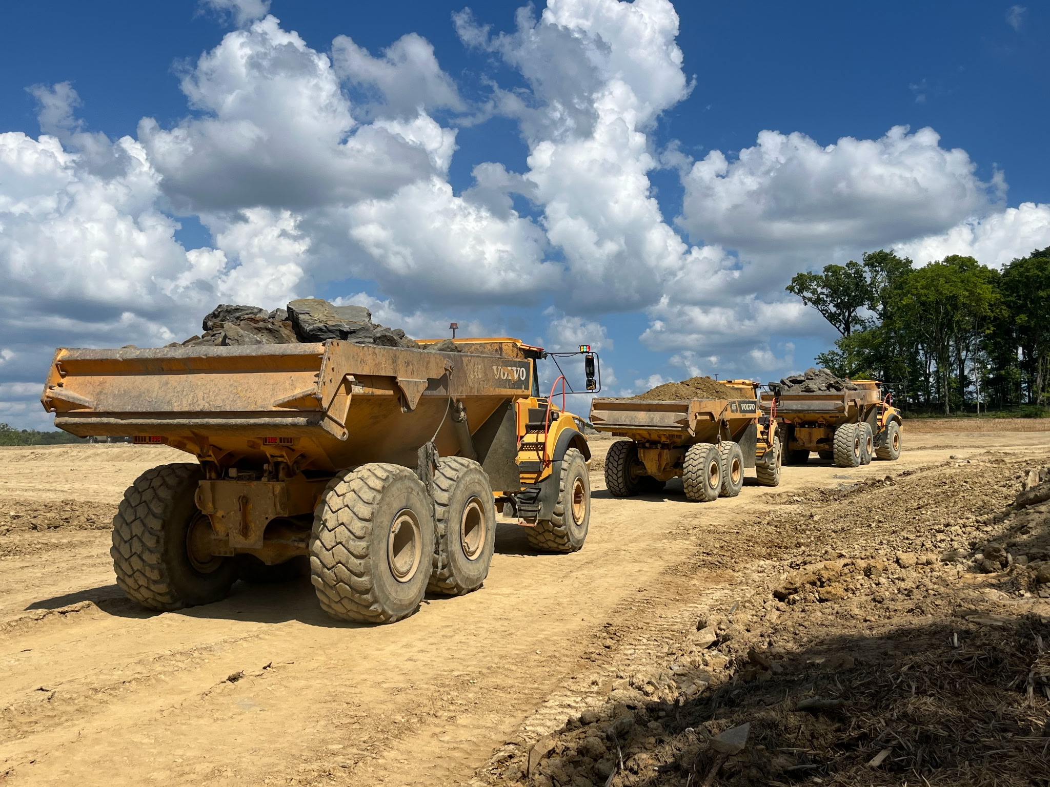JKE (Josh King Excavation)  dump trucks lined up