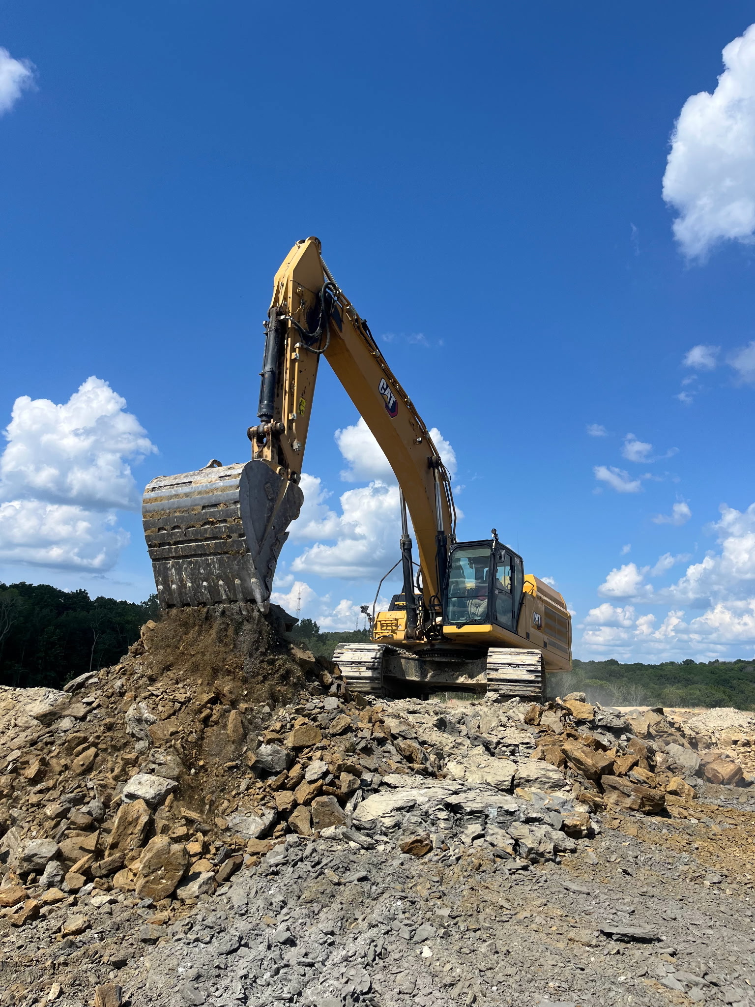 JKE (Josh King Excavation) excavator moving dirt